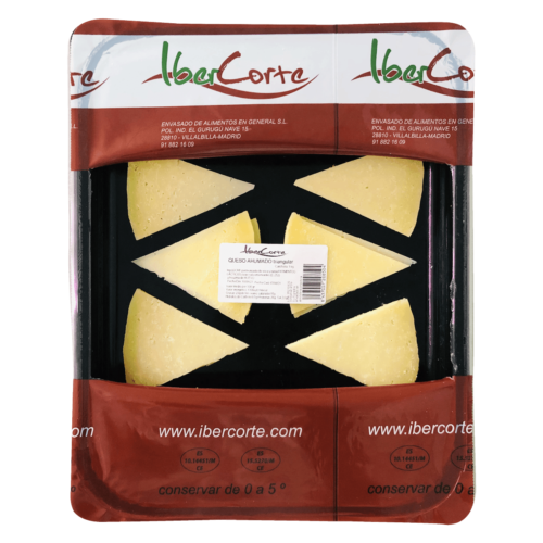 Bandeja de Queso ahumado en loncha triangular y envasado en atmósfera protectora.<br>Formatos de 500 grs 1 kg y 2 kg